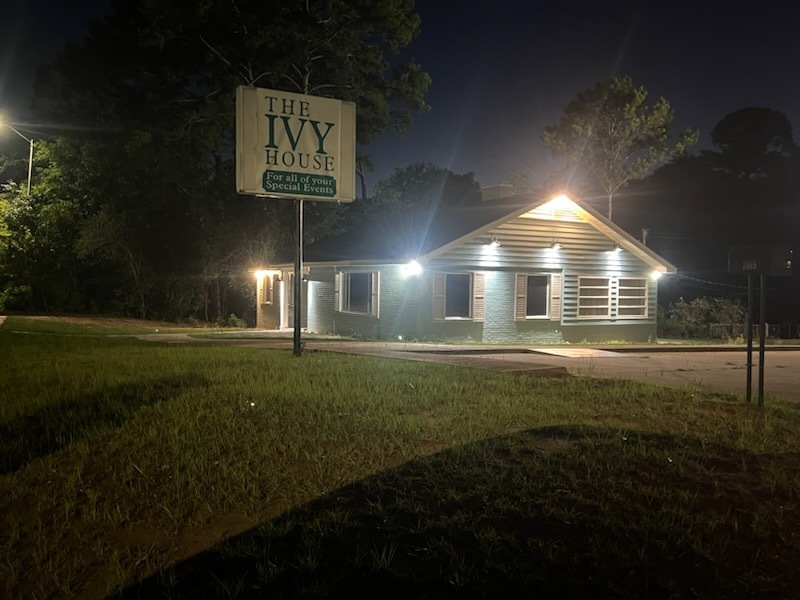 The Ivy House sign lit up at night in front of the venue